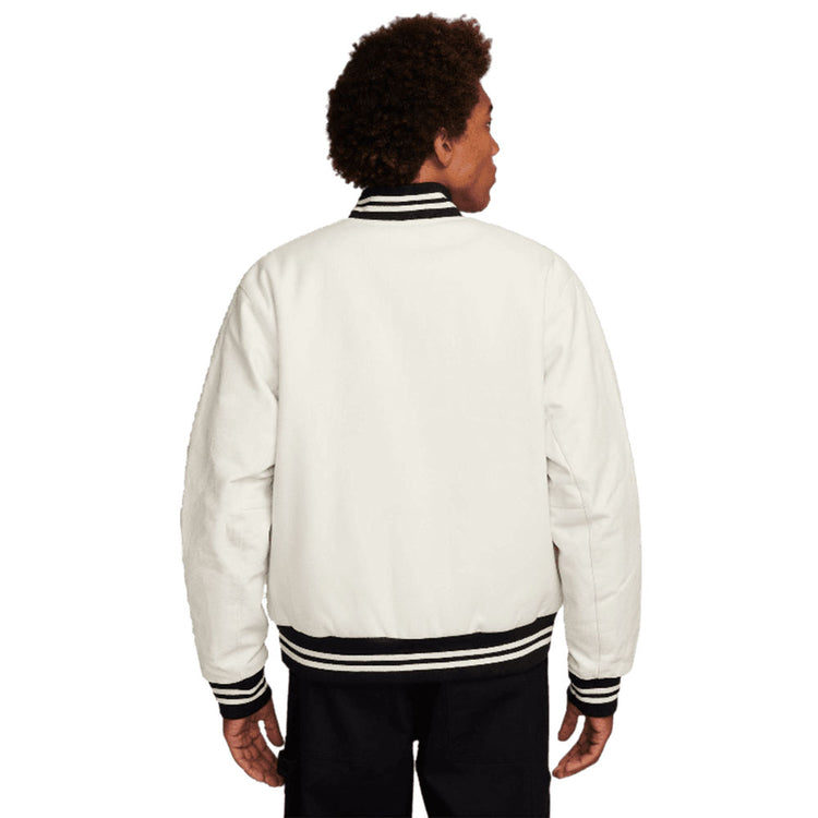 NIKE M NK AU VARSITY JKT LTHR SLV FD7845-133